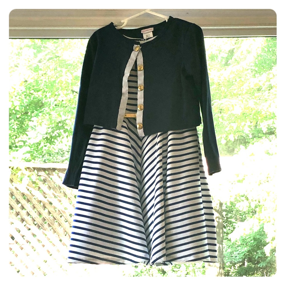 Stylish navy and white dress and jacket set.